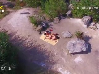 নগ্ন সাগর পাড় যৌন, voyeurs প্রদর্শনী taken দ্বারা একটি drone